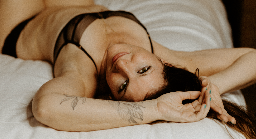 andrea bertoli on a bed
